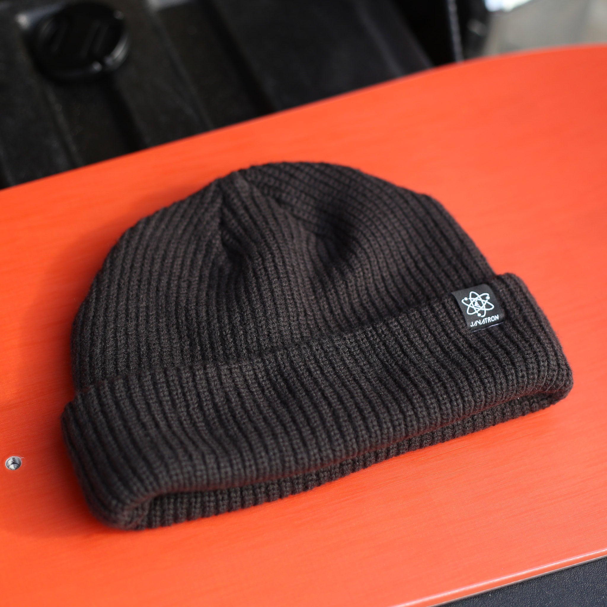 javatron dream machine beanie on a jazz chord snowboard