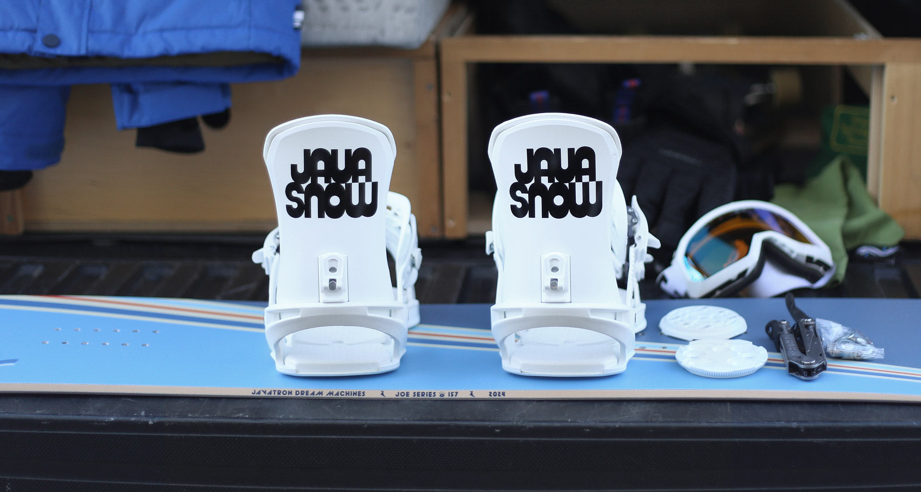 Joe snowboard bindings installation on the tailgate of a truck. 